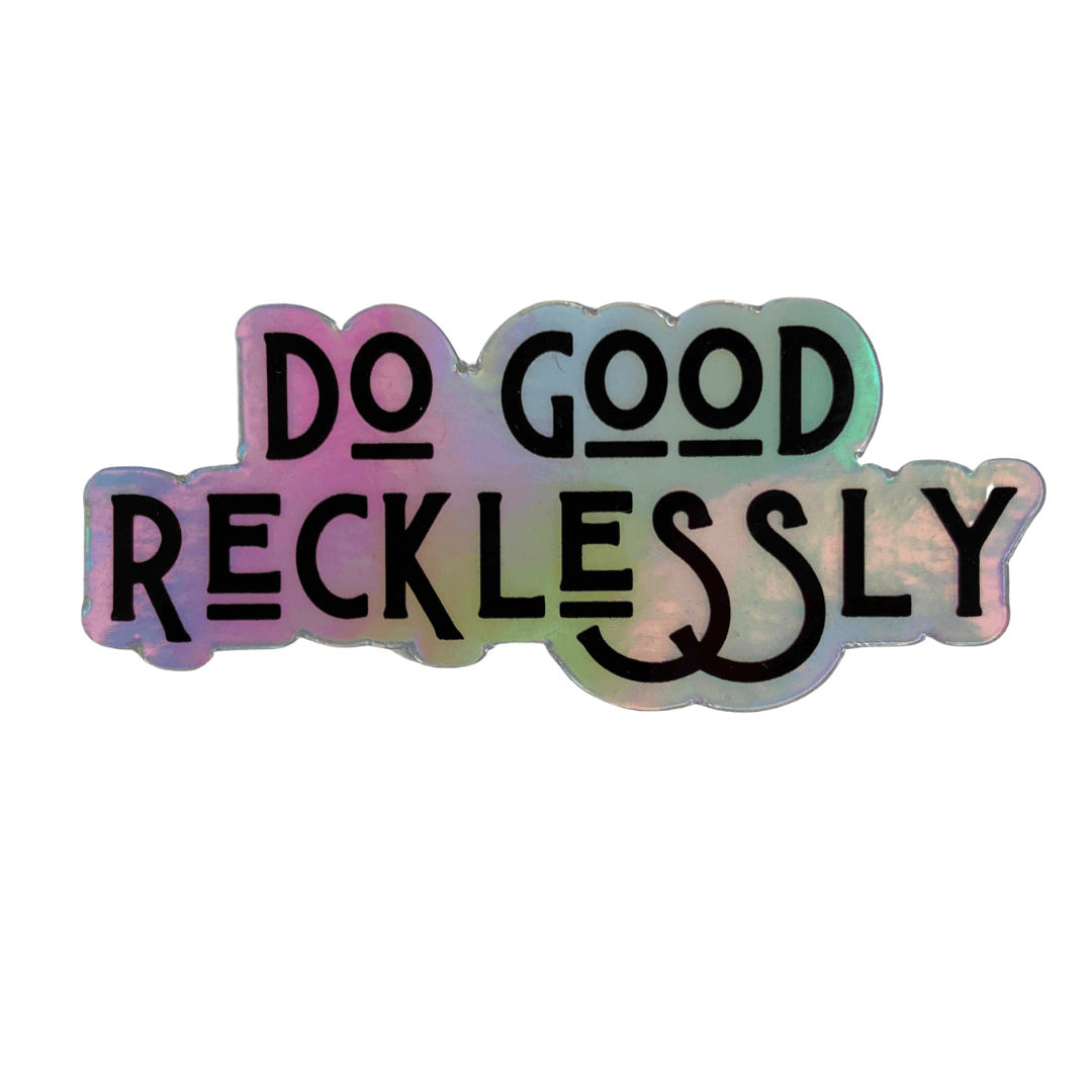 Holographic sticker that says "do good recklessly"