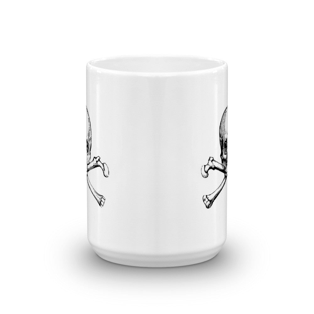 Side view of white coffee mug with skull and crossbones logos barely visible